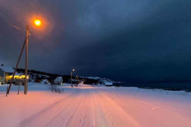 Snow slopes by the fjord