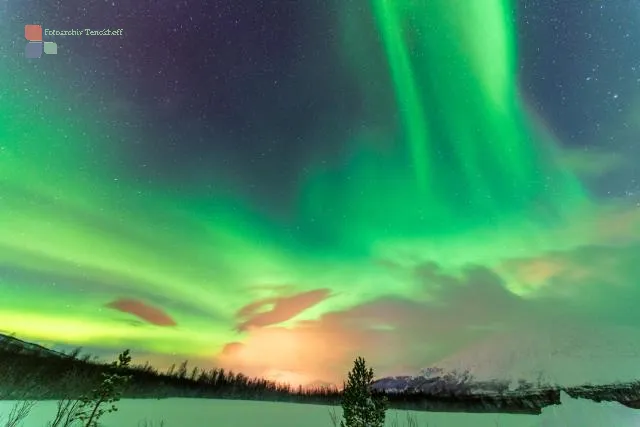 Northern lights in the Lyngenfjord Alps at the seventieth latitude