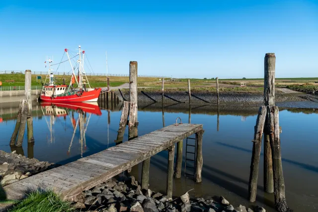 Red fishing boat in the southern harbor