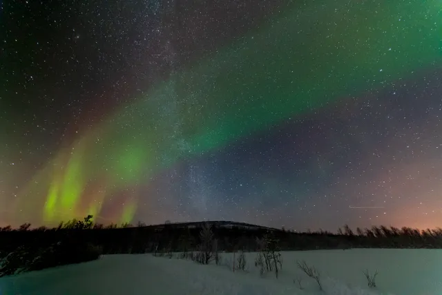 Northern lights with Milky Way in the Lyngenfjord Alps