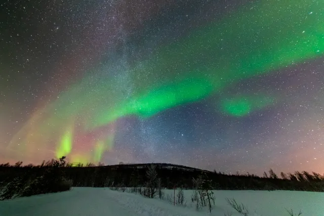 Northern lights with Milky Way in the Lyngenfjord Alps