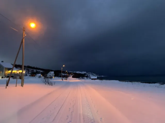 Snow slopes by the fjord