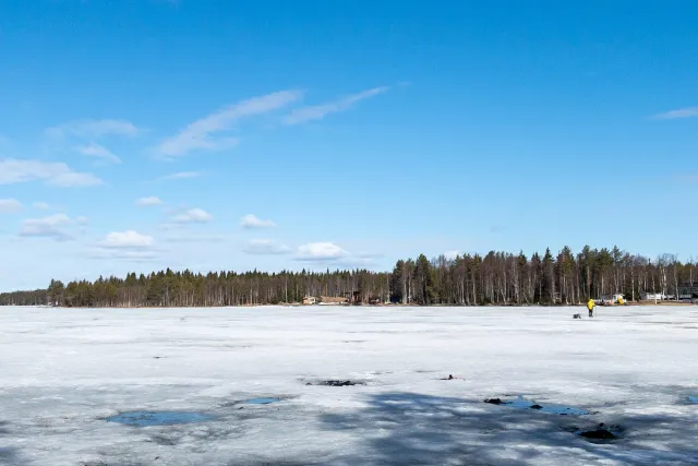 The ice fishermen in the Arctic Circle