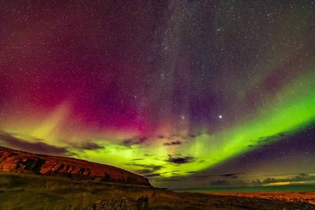 Northern lights, Milky Way and Varangerfjord