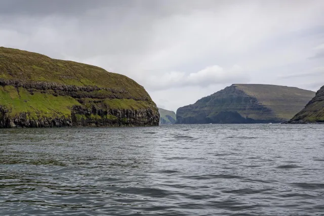 The sea and the steep cliffs between the islands of Vidoy, Fugloy and Svinoy